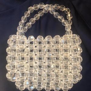 Clear, acrylic faceted beaded bag
